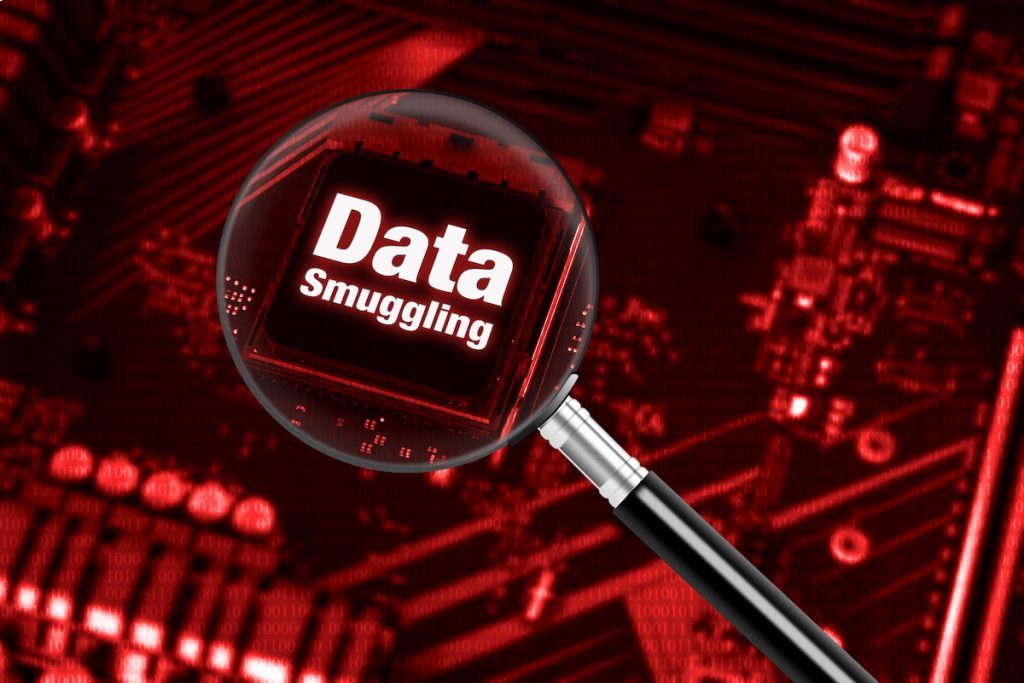 A magnifying glass over the word data smuggling.