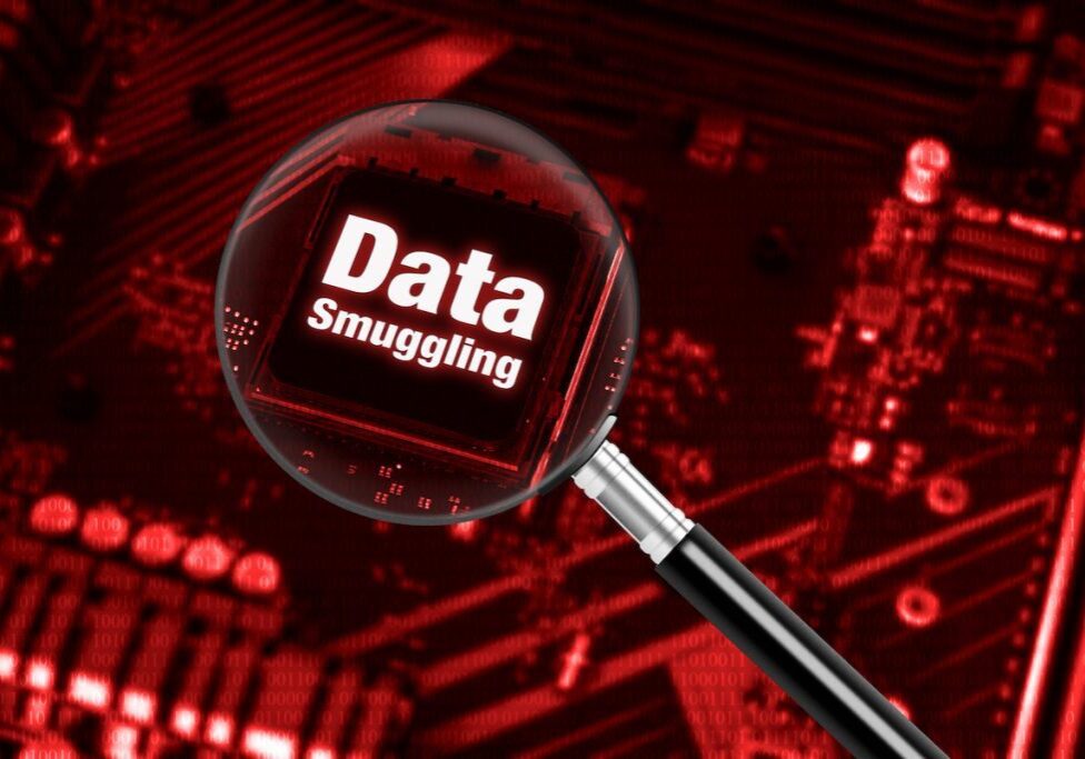 A magnifying glass over the word data smuggling.